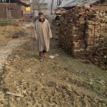 Flood damaged house in Pampore, Kashmir  and rebuilding supported by RRAI